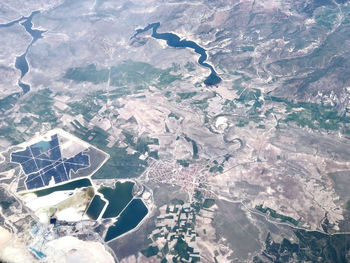 High angle view of aerial shot of sea and landscape