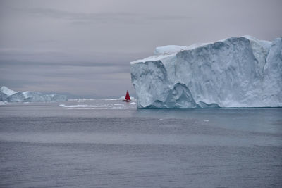 Scenic view of sea against sky during winter