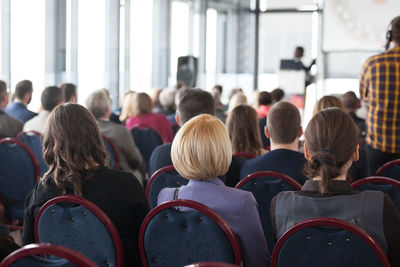 Rear view of people in seminar