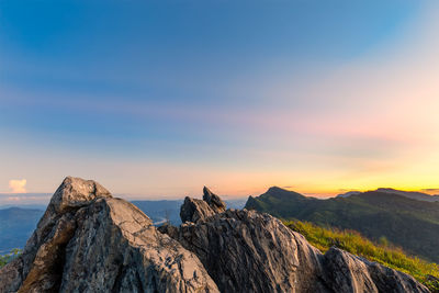 Scenic view of mountains against sky during sunset