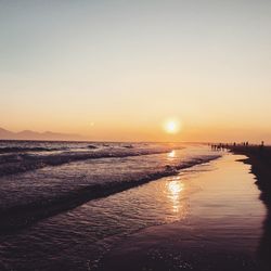 Scenic view of sea at sunset