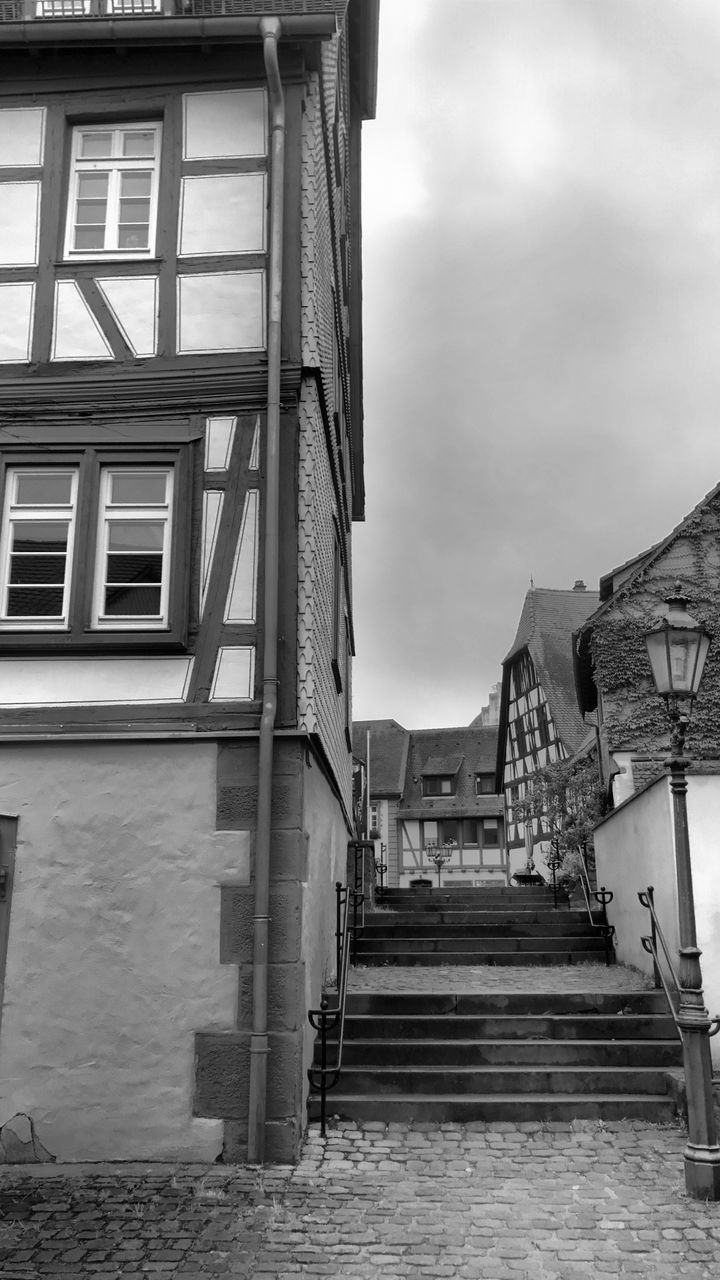 STAIRCASE OF BUILDING AGAINST SKY