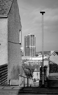 Buildings in city against sky