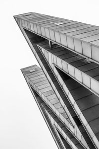 Low angle view of skyscraper against clear sky