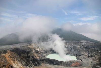 Scenic view of volcanic mountain against sky