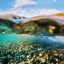 Close-up of stones in sea