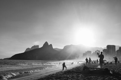 People walking on beach