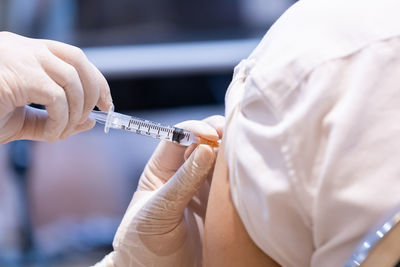 Close-up of hand holding hands