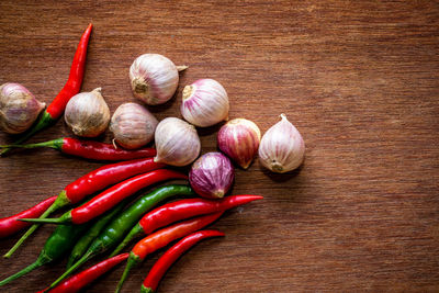 Close-up of chili peppers on table