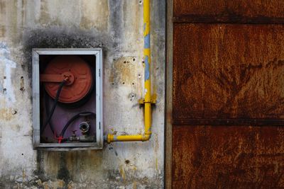 Close-up of fuse box on building