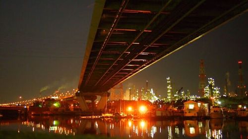 Bridge over river at night