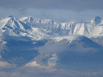 Scenic view of snowcapped mountains