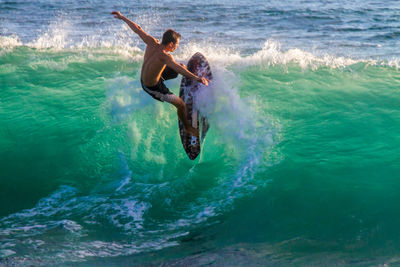 Man surfing in sea