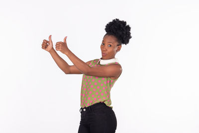 Portrait of woman standing against white background
