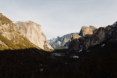 Rock formations on mountain against sky