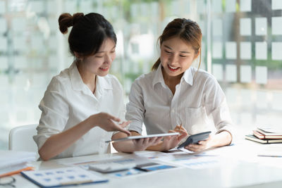 Business colleagues working at office