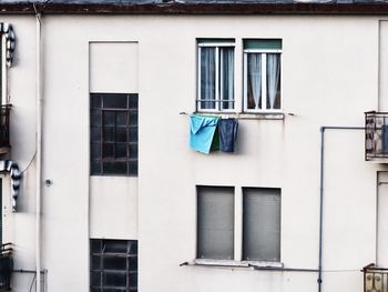 Low angle view of clothes drying on balcony