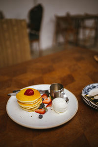 Close-up of breakfast served on table at home