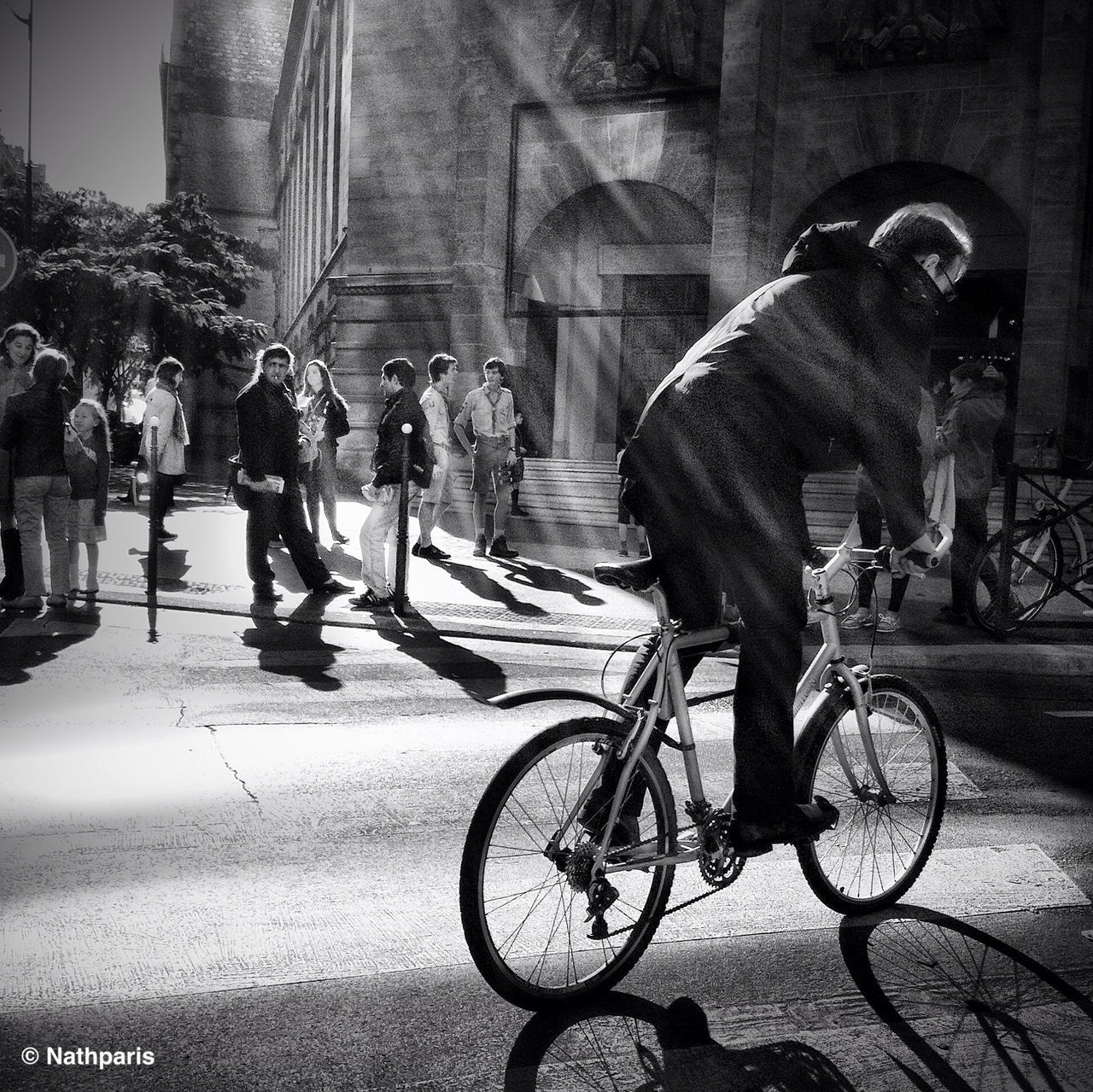 bicycle, architecture, built structure, building exterior, transportation, mode of transport, land vehicle, street, wall - building feature, stationary, parking, city, arch, building, day, cobblestone, outdoors, parked, sidewalk, shadow