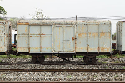 Train on railroad track against sky