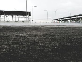 Surface level of empty road against sky