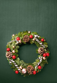 Directly above shot of christmas wreath on table