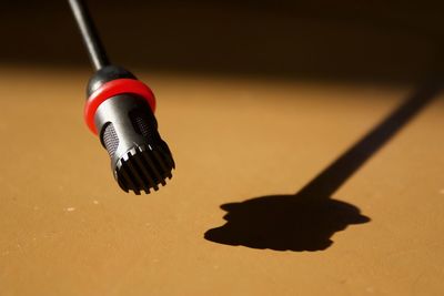 Close-up of microphone on table