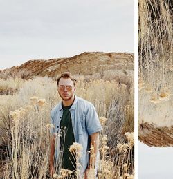 Portrait of young man standing against sky