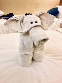 Stuffed toy on bed at home