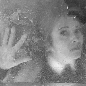 Close-up portrait of woman in swimming pool