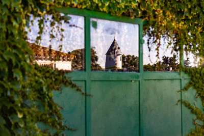 Old building seen through window