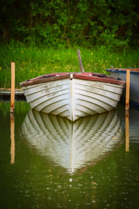 Boat floating on lake