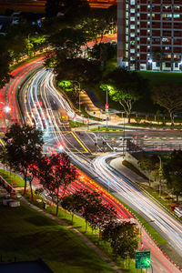 High angle view of light trails on road at night
