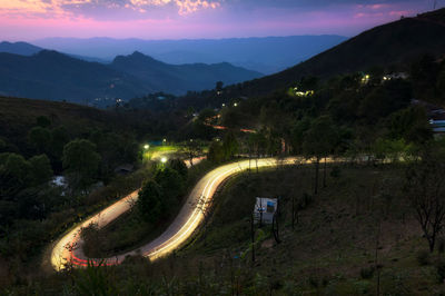 High angle view of road against sky at night