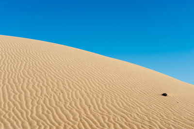 View of built structure against clear blue sky