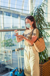 Young woman using mobile phone