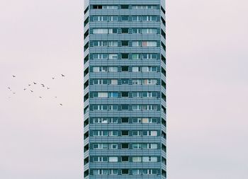 Low angle view of skyscrapers against sky