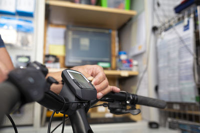 Man photographing with bicycle