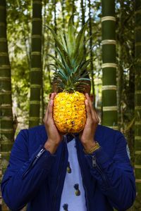 Close-up portrait of a man on tree