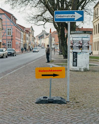 Information sign on road in city