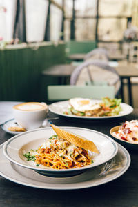 Close-up of food served on table