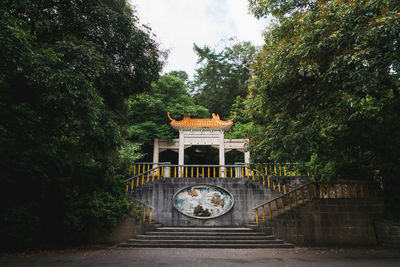 View of temple against building