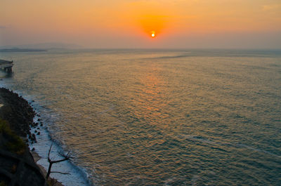 Scenic view of sea against sky during sunset