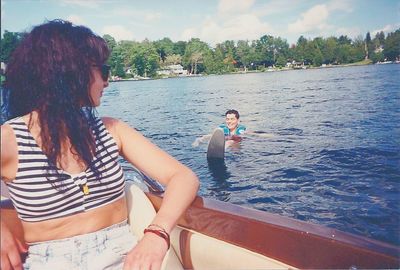 People relaxing in water