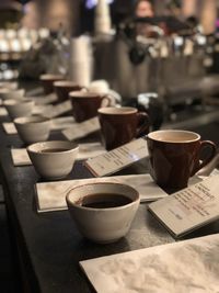 Close-up of coffee cupping on table