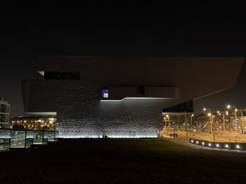 Illuminated building at night