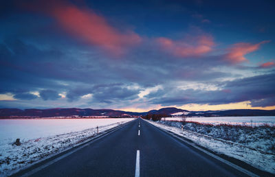 Road against sky during winter