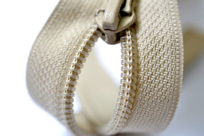 Close-up of chain against white background