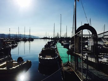 Boats moored at harbor