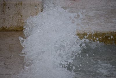 Close-up of wave splashing on wall
